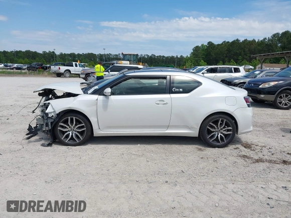 2015 Scion tC z VIN JTKJF5C79F3093318, wystawiony jako IAAI lot #42186403 z przebiegiem 178 922 mil mil oraz . Historia ofert i sprzedaży dostępna na DreamBid. Obrazek 14.