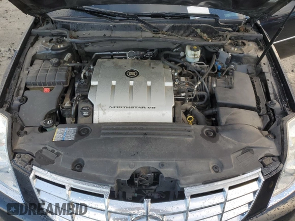 2008 Cadillac DTS 1SD z VIN 1G6KD57Y78U192983, wystawiony jako Copart lot #87672955 z przebiegiem 112 376 mil mil oraz Szkoda całkowita • Salvage title. Historia ofert i sprzedaży dostępna na DreamBid. Obrazek 11.