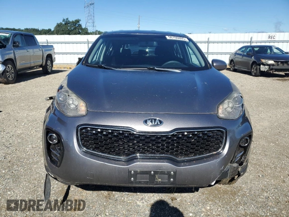 2017 Kia Sportage LX z VIN KNDPMCACXH7068094, wystawiony jako Copart lot #56706805 z przebiegiem 119 304 mil mil oraz Szkoda całkowita • Salvage title. Historia ofert i sprzedaży dostępna na DreamBid. Obrazek 5.