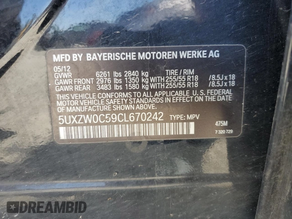 2012 BMW X5 35d z VIN 5UXZW0C59CL670242, wystawiony jako Copart lot #57638165 z przebiegiem 174 430 mil mil oraz Szkoda całkowita • Salvage title. Historia ofert i sprzedaży dostępna na DreamBid. Obrazek 13.