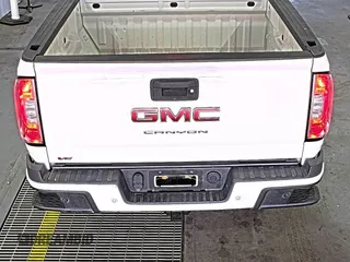 2021 GMC Canyon 2WD Elevation z VIN 1GTG5CEN5M1140499, wystawiony jako IAAI lot #42556124 z przebiegiem 41 450 mil mil oraz . Historia ofert i sprzedaży dostępna na DreamBid. Obrazek 19.