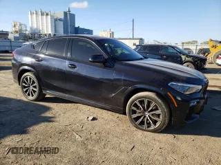 2020 BMW X6 xDrive40i z VIN 5UXCY6C03L9D00816, wystawiony jako Copart lot #76538674 z przebiegiem Nie podano mil oraz Szkoda całkowita • Salvage title. Historia ofert i sprzedaży dostępna na DreamBid. Obrazek 4.