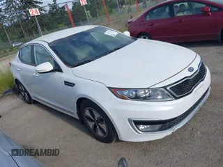 2012 Kia Optima Hybrid with VIN KNAGM4AD9C5011658, listed as a IAAI auction lot 42197129 with 142,977 mi miles. Bid and sale history available at carsss.com. Image 1.