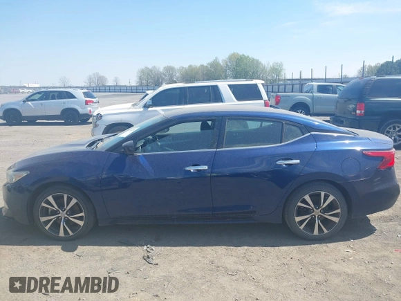2016 Nissan Maxima SV z VIN 1N4AA6AP3GC386959, wystawiony jako IAAI lot #41886544 z przebiegiem 155 362 mil mil oraz . Historia ofert i sprzedaży dostępna na DreamBid. Obrazek 14.