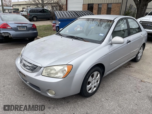2004 Kia Spectra LX with VIN KNAFE121845043143, listed as a IAAI auction lot 41574523 with 211,758 mi miles. Bid and sale history available at carsss.com. Image 2.