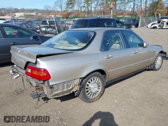 1995 Acura Legend L w/Cloth with VIN JH4KA7668SC012813, listed as a IAAI auction lot 41789026 with 242,265 mi miles. Bid and sale history available at carsss.com. Image 4.
