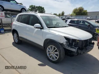 2016 Volkswagen Tiguan SEL with VIN WVGAV7AX8GW581339, listed as a Copart auction lot 52997855 with 47,096 mi miles and Salvage Title. Bid and sale history available at DreamBid. Image 4.