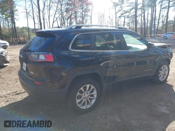2019 Jeep Cherokee Latitude with VIN 1C4PJLCB6KD490529, listed as a IAAI auction lot 41890940 with 113,147 mi miles. Bid and sale history available at carsss.com. Image 4.