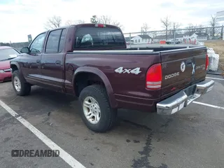 2004 Dodge Dakota SLT with VIN 1D7HG48NX4S751497, listed as a IAAI auction lot 41737935 with 106,064 mi miles. Bid and sale history available at carsss.com. Image 3.