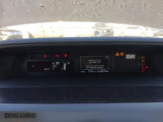2016 Toyota Prius v Two with VIN JTDZN3EU9GJ043181, listed as a IAAI auction lot 41893645 with 135,895 mi miles. Bid and sale history available at carsss.com. Image 7.
