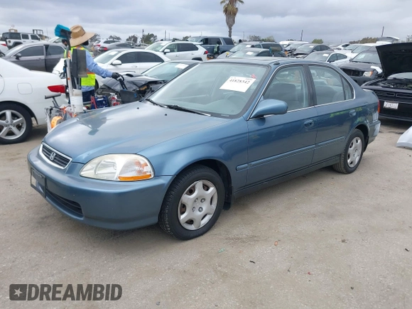 1998 Honda Civic EX with VIN JHMEJ8644WS002096, listed as a IAAI auction lot 41828342 with 184,283 mi miles. Bid and sale history available at carsss.com. Image 2.