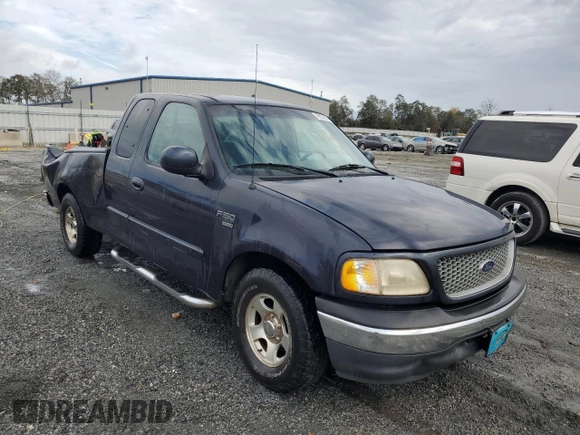 1999 Ford F-150 XL with VIN 1FTRX17L6XNB12078, listed as a Copart auction lot 79332914 with 168,591 mi miles and Salvage Title. Bid and sale history available at carsss.com. Image 4.