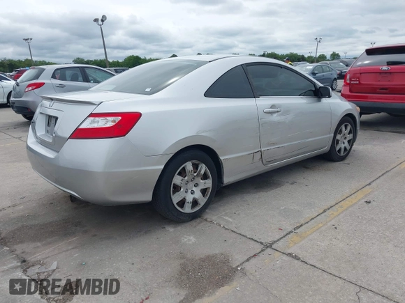 2006 Honda Civic Cpe LX with VIN 2HGFG12606H568106, listed as a IAAI auction lot 41983712 with 196,957 mi miles. Bid and sale history available at carsss.com. Image 4.
