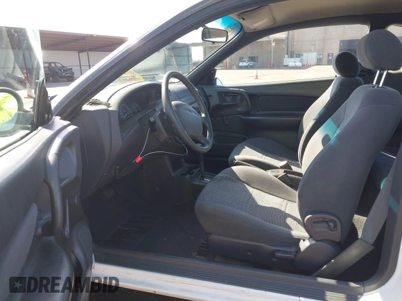 2000 Ford Escort ZX2 z VIN 3FAKP1134YR161407, wystawiony jako IAAI lot #42199401 z przebiegiem 150 611 mil mil oraz . Historia ofert i sprzedaży dostępna na DreamBid. Obrazek 5.