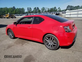2015 Scion tC z VIN JTKJF5C78F3091348, wystawiony jako Copart lot #54659525 z przebiegiem 229 840 mil mil oraz Szkoda całkowita • Salvage title. Historia ofert i sprzedaży dostępna na DreamBid. Obrazek 2.