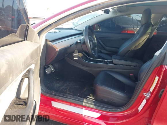 2018 Tesla Model 3 Long Range Battery with VIN 5YJ3E1EA3JF035785, listed as a IAAI auction lot 41986774 with 33,965 mi miles and . Bid and sale history available at DreamBid. Image 5.