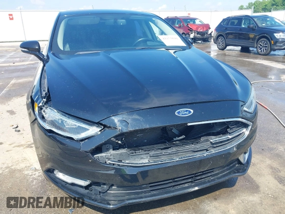 2017 Ford Fusion SE with VIN 3FA6P0T94HR321704, listed as a IAAI auction lot 42253691 with 129,115 mi miles and . Bid and sale history available at DreamBid. Image 6.