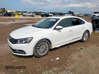 2016 Volkswagen Passat SE z VIN 1VWBT7A32GC013789, wystawiony jako Copart lot #58818575 z przebiegiem 233 893 mil mil oraz Czysty tytuł • Clean title. Historia ofert i sprzedaży dostępna na DreamBid. Obrazek 1.