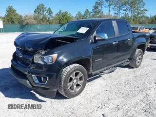 2016 Chevrolet Colorado 2WD Z71 z VIN 1GCGSDE39G1253003, wystawiony jako IAAI lot #41830474 z przebiegiem 74 000 mil mil oraz . Historia ofert i sprzedaży dostępna na DreamBid. Obrazek 18.