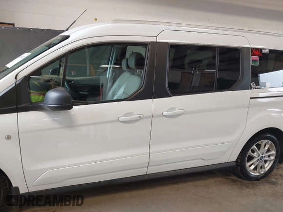 2015 Ford Transit Connect XLT z VIN NM0GS9F71F1194474, wystawiony jako IAAI lot #41666625 z przebiegiem 111 224 mil mil oraz . Historia ofert i sprzedaży dostępna na DreamBid. Obrazek 15.