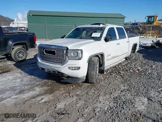 2018 GMC Sierra 1500 Denali with VIN 3GTU2PEC8JG519642, listed as a IAAI auction lot 41427185 with 111,596 mi miles. Bid and sale history available at carsss.com. Image 18.