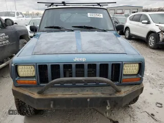 1999 Jeep Cherokee Sport with VIN 1J4FF68S4XL567848, listed as a Copart auction lot 43222045 with 280,178 mi miles and Salvage title. Bid and sale history available at DreamBid. Image 5.