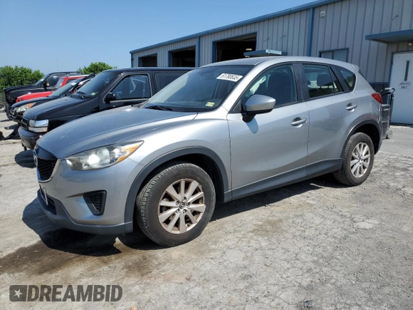 2014 Mazda CX-5 Sport with VIN JM3KE2BE7E0334880, listed as a Copart auction lot 61780635 with 96,926 mi miles and Salvage title. Bid and sale history available at DreamBid. Image 1.