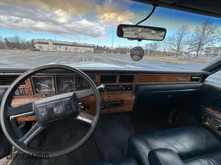 1985 Lincoln Town Car with VIN 1LNBP96F0FY701258, listed as a Copart auction lot 87185384 with 28,215 mi miles and Clean Title. Bid and sale history available at carsss.com. Image 9.