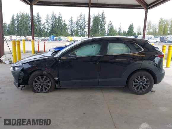 2024 Mazda CX-30 2.5 S with VIN 3MVDMBAM5RM633007, listed as a IAAI auction lot 42014511 with 11,895 mi miles. Bid and sale history available at carsss.com. Image 14.