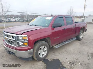 2014 Chevrolet Silverado 1500 LT with VIN 3GCUKREC0EG293503, listed as a IAAI auction lot 41536590 with 140,865 mi miles. Bid and sale history available at carsss.com. Image 2.