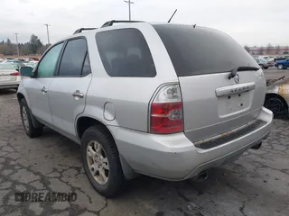 2004 Acura MDX Touring Pkg w/Navigation with VIN 2HNYD18854H532511, listed as a IAAI auction lot 41460033 with 216,934 mi miles. Bid and sale history available at carsss.com. Image 3.