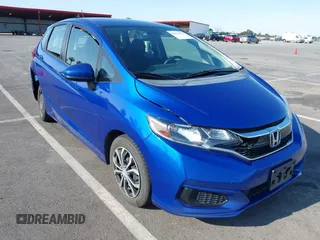 2020 Honda Fit LX z VIN 3HGGK5H4XLM705405, wystawiony jako IAAI lot #42570523 z przebiegiem 183 416 mil mil oraz . Historia ofert i sprzedaży dostępna na DreamBid. Obrazek 1.