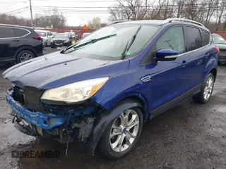 2014 Ford Escape Titanium with VIN 1FMCU9J99EUA46103, listed as a IAAI auction lot 42018097 with 169,878 mi miles and . Bid and sale history available at DreamBid. Image 17.