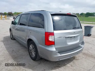 2014 Chrysler Town & Country Touring-L with VIN 2C4RC1CG2ER107917, listed as a IAAI auction lot 42180194 with 169,447 mi miles. Bid and sale history available at carsss.com. Image 3.