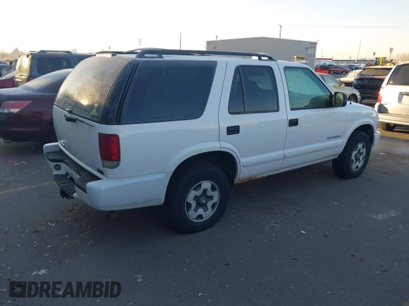 2004 Chevrolet Blazer LS z VIN 1GNDT13X34K161001, wystawiony jako IAAI lot #41432856 z przebiegiem Nie podano mil oraz . Historia ofert i sprzedaży dostępna na DreamBid. Obrazek 4.