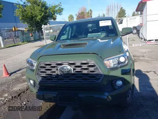 2021 Toyota Tacoma SR with VIN 3TMCZ5AN7MM395940, listed as a IAAI auction lot 41240832 with 39,338 mi miles and . Bid and sale history available at DreamBid. Image 12.