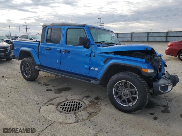 2023 Jeep Gladiator Overland with VIN 1C6HJTFG1PL515353, listed as a Copart auction lot 88072265 with 32,301 mi miles and Salvage Title. Bid and sale history available at carsss.com. Image 4.