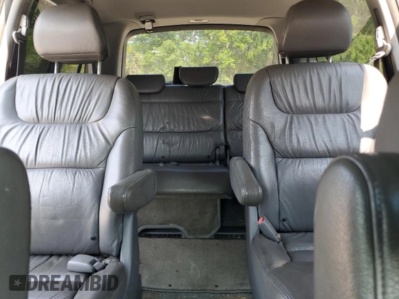 2006 Honda Odyssey EX-L with VIN 5FNRL38706B037805, listed as a Copart auction lot 57390365 with 219,554 mi miles and Salvage title. Bid and sale history available at DreamBid. Image 10.