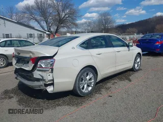 2014 Chevrolet Impala LT with VIN 1G1125S33EU101464, listed as a IAAI auction lot 41863521 with 215,270 mi miles and . Bid and sale history available at DreamBid. Image 4.