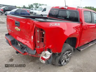 2020 Chevrolet Colorado 4WD Z71 with VIN 1GCGTDEN9L1105636, listed as a IAAI auction lot 42634615 with 106,469 mi miles and . Bid and sale history available at DreamBid. Image 6.