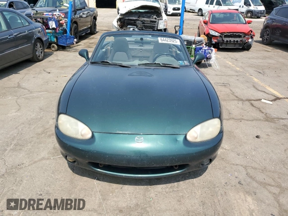 2000 Mazda MX-5 Miata with VIN JM1NB3533Y0151883, listed as a Copart auction lot 64423925 with 180,275 mi miles and Salvage title. Bid and sale history available at DreamBid. Image 5.