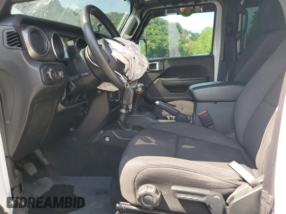 2023 Jeep Wrangler Sport with VIN 1C4HJXDGXPW596127, listed as a Copart auction lot 65395655 with 64,257 mi miles and Salvage title. Bid and sale history available at DreamBid. Image 7.