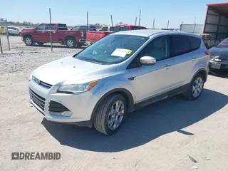 2013 Ford Escape SEL with VIN 1FMCU9H91DUA14749, listed as a IAAI auction lot 42039685 with 186,669 mi miles. Bid and sale history available at carsss.com. Image 2.