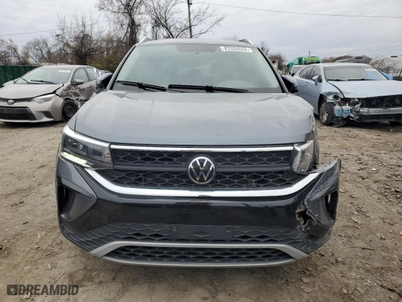 2022 Volkswagen Taos SE with VIN 3VVLX7B25NM098531, listed as a Copart auction lot 83326534 with 56,758 mi miles and Salvage Title. Bid and sale history available at carsss.com. Image 5.
