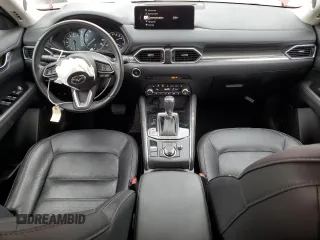 2021 Mazda CX-5 Grand Touring Reserve with VIN JM3KFBAY3M0315640, listed as a Copart auction lot 51004955 with 21,981 mi miles and Salvage Title. Bid and sale history available at DreamBid. Image 8.