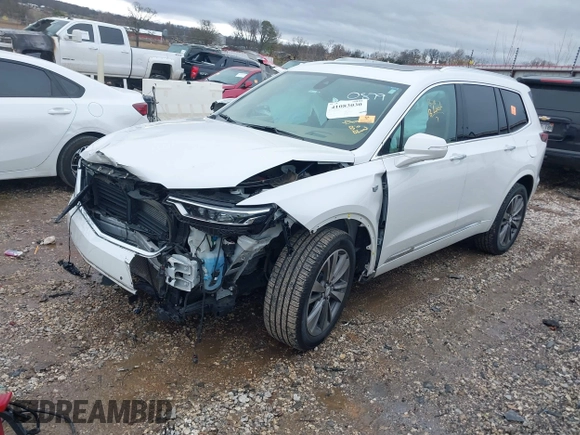 2021 Cadillac XT6 Premium Luxury with VIN 1GYKPFRS0MZ100879, listed as a IAAI auction lot 41083030 with 56,502 mi miles and . Bid and sale history available at DreamBid. Image 2.