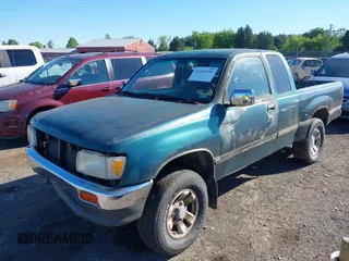 1997 Toyota T100 SR5 with VIN JT4UN24D8V0043214, listed as a IAAI auction lot 42194142 with 292,713 mi miles and . Bid and sale history available at DreamBid. Image 2.
