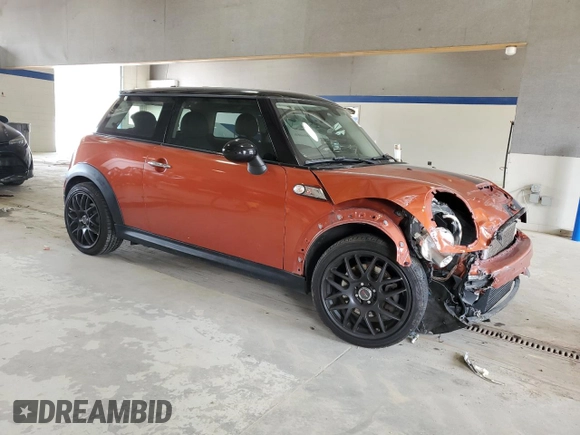 2013 MINI Hardtop S with VIN WMWSV3C52DT396176, listed as a Copart auction lot 59207165 with 104,194 mi miles and Salvage title. Bid and sale history available at DreamBid. Image 4.