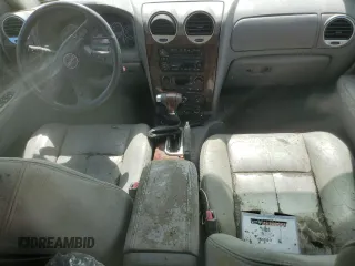 2005 GMC Envoy SLT with VIN 1GKDT13S052311455, listed as a Copart auction lot 73635434 with Not Provided miles and Salvage Title. Bid and sale history available at DreamBid. Image 8.