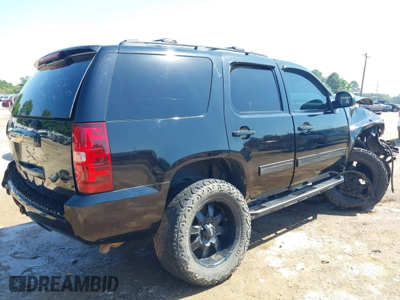 2013 Chevrolet Tahoe LS with VIN 1GNSCAE06DR263469, listed as a IAAI auction lot 42245636 with 240,506 mi miles and . Bid and sale history available at DreamBid. Image 4.